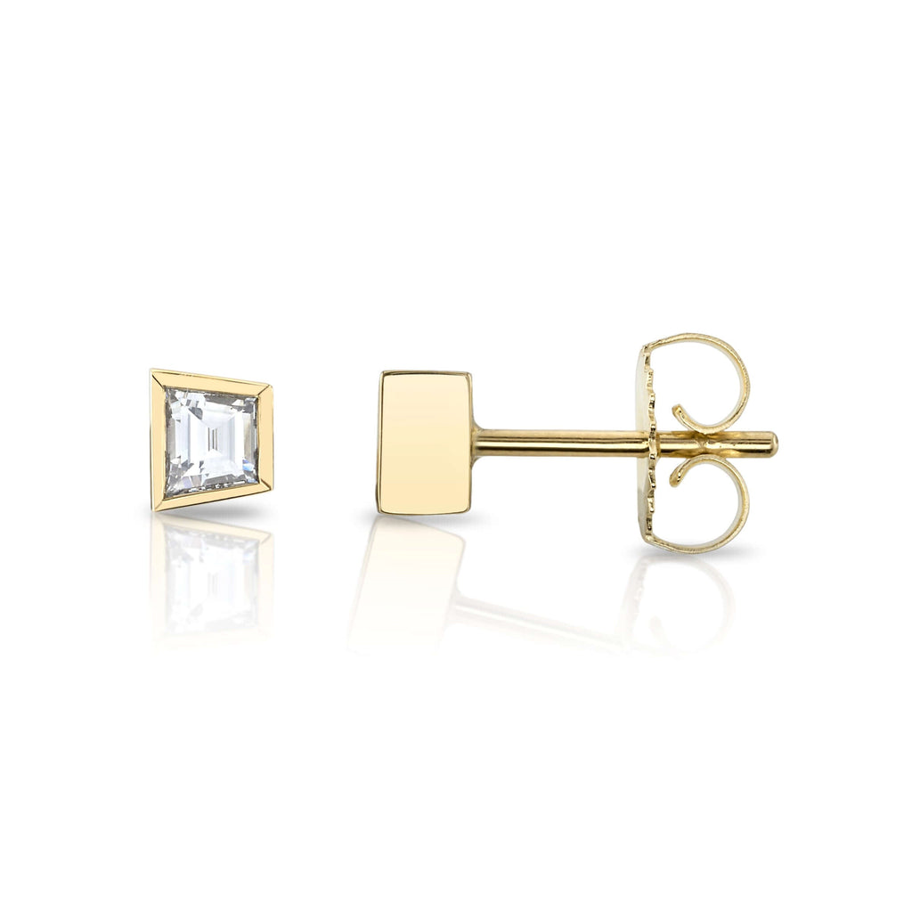 SINGLE STONE SLOANE STUDS | Earrings featuring 0.43ctw G/VS1 trapezoid cut diamonds bezel set in handcrafted 18K yellow gold stud earrings.