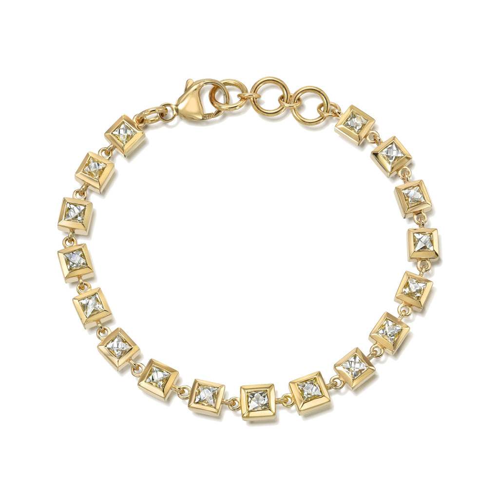SINGLE STONE SMALL KARINA BRACELET featuring 5.45ctw J-K/VS-SI French cut diamonds bezel set on a handcrafted 18K yellow gold tennis bracelet. Bracelet measures 7.25".