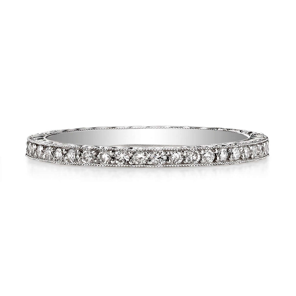 SINGLE STONE MOLLY BAND | Approximately 0.40ctw G-H/VS old European cut diamonds set in an handcrafted eternity band featuring engraved sidewalls. Approximate band with 1.6mm. Please inquire for additional customization.