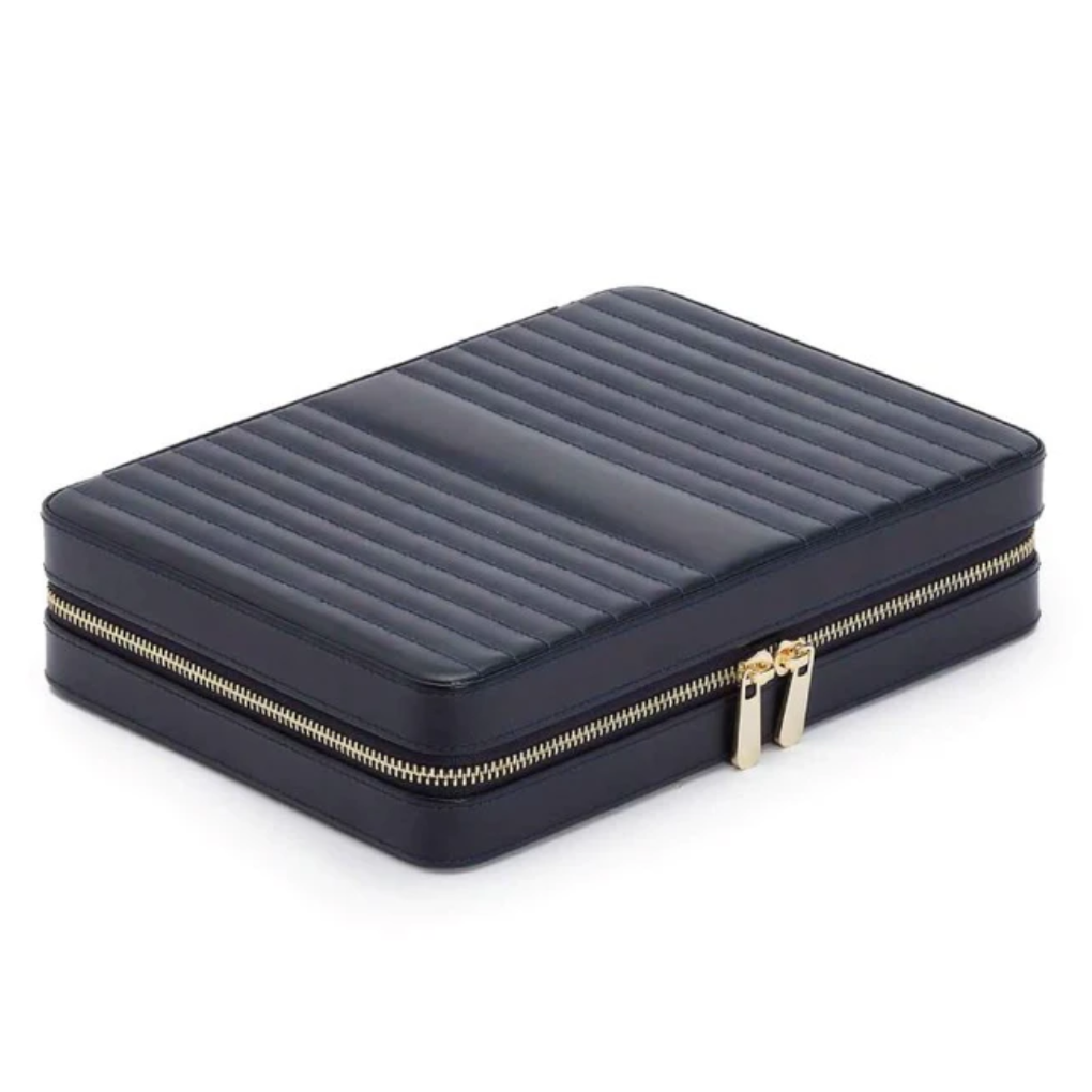 MARIA LARGE ZIP CASE, Material: Leather 
Storage: 10 ring rolls, 2 open compartments, 1 lidded compartment, 2 drawstring pouches,  6 necklace snap-on hooks with pocket, 1 ring bar, one earring bar. 
LusterLoc™: Allows the fabric lining the inside of your jewellery cases to absorb the hostile gases known to cause tarnishing. Under typical storage conditions, it can prevent tarnishing for up to 35 years 

, Gifts, WOLF DESIGNS, INC
