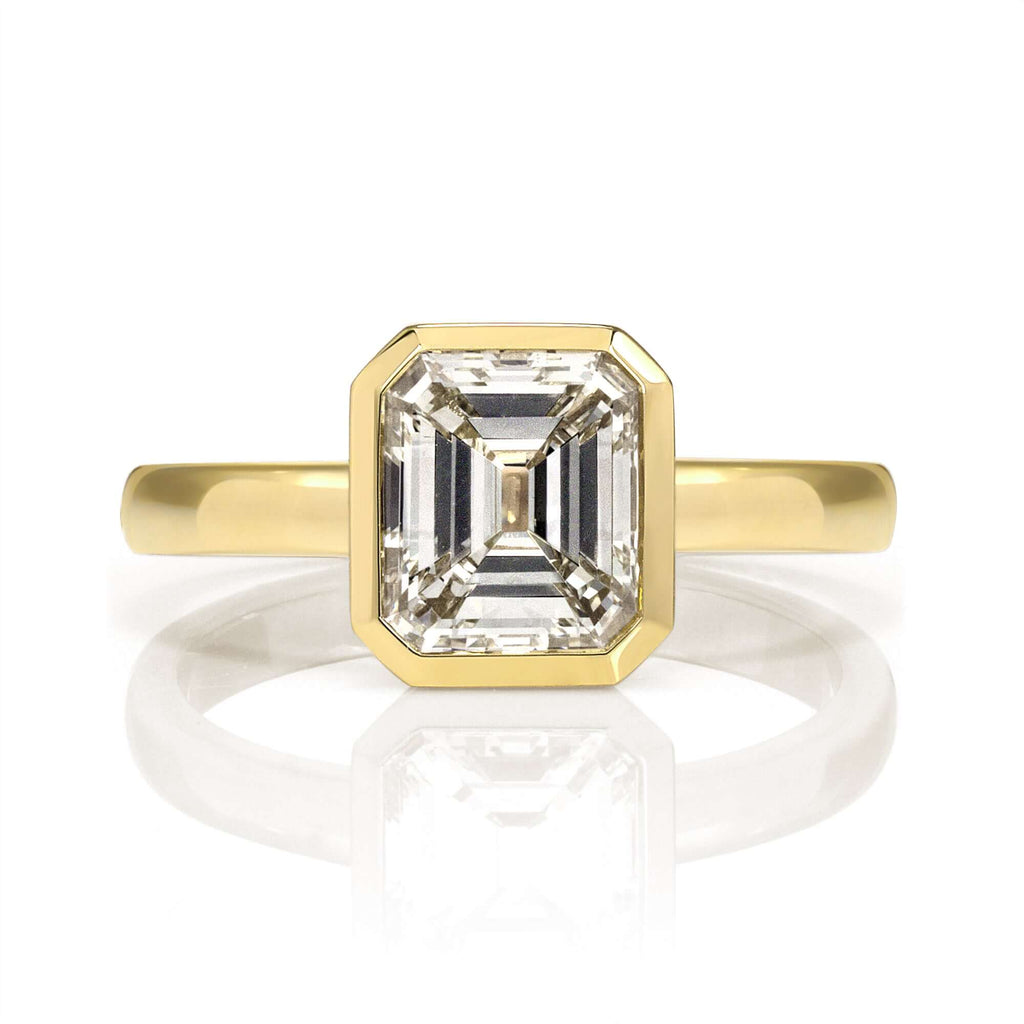 SINGLE STONE WYLER RING featuring 1.51ct M/VS2 GIA certified Emerald cut diamond bezel set in a handcrafted 18K yellow gold mounting.