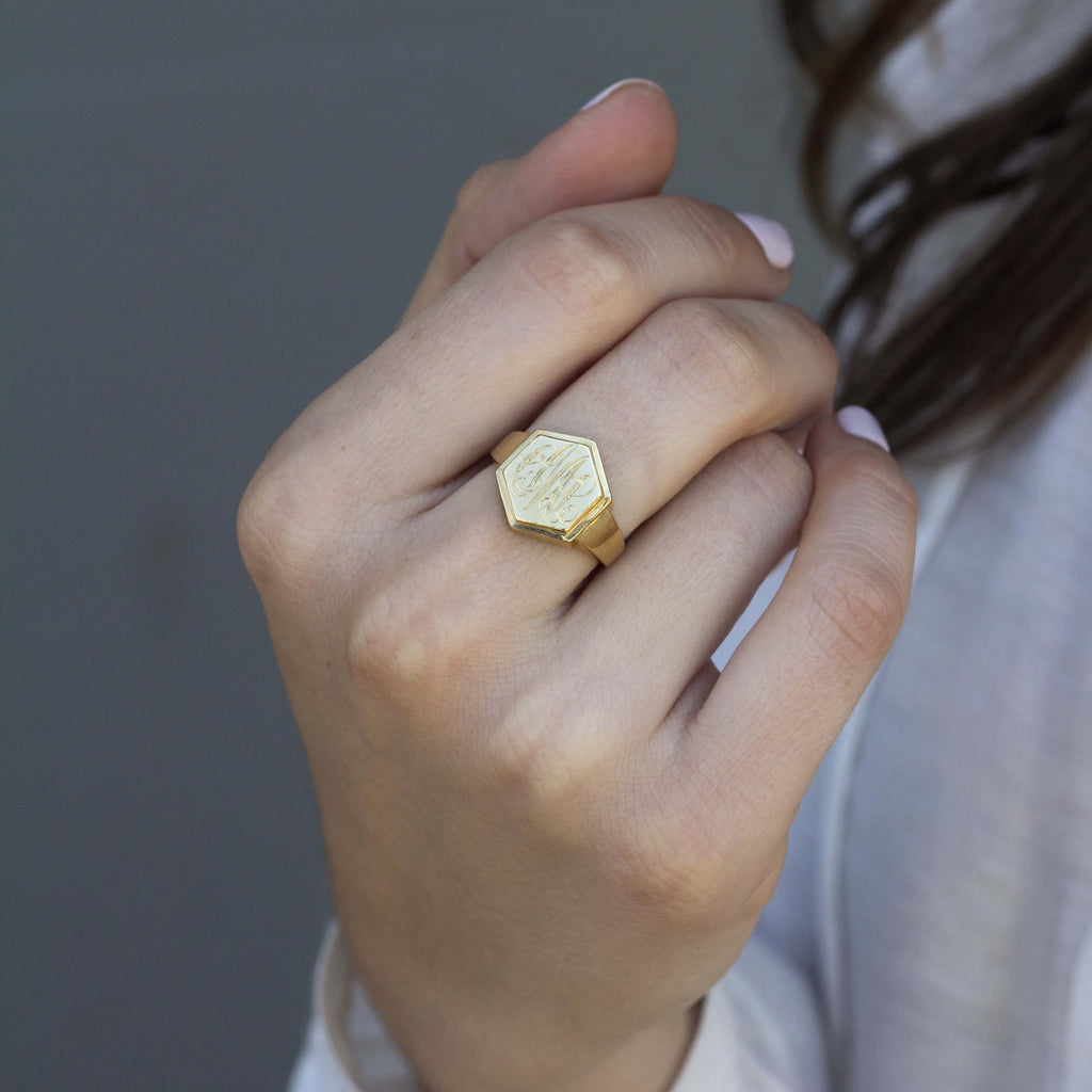 SINGLE STONE ZOE RING featuring Vintage inspired 18K yellow gold hexagon signet ring. Available with or without diamonds. Price includes monogrammed engraving of up to three letters in any of the styles shown above - please be sure to specify before placi