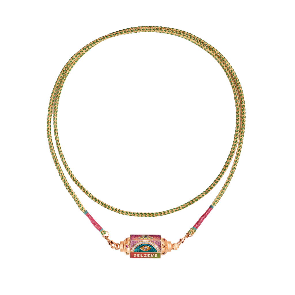 BELIEVE LOCKET, 18K PINK GOLD LOCKET, SET WITH DIAMONDS, SAPPHIRES AND TSAVORITES, AND ENAMEL. THIS LOCKET IS SOLD ON A 73CM RATHI LINK THAT CAN BE WORN IN A DOUBLE LOOP. 18K pink goldGold weight : 10.9grs25 Diamonds (0.13ct) 11 Multicolor Sapphires (0.19