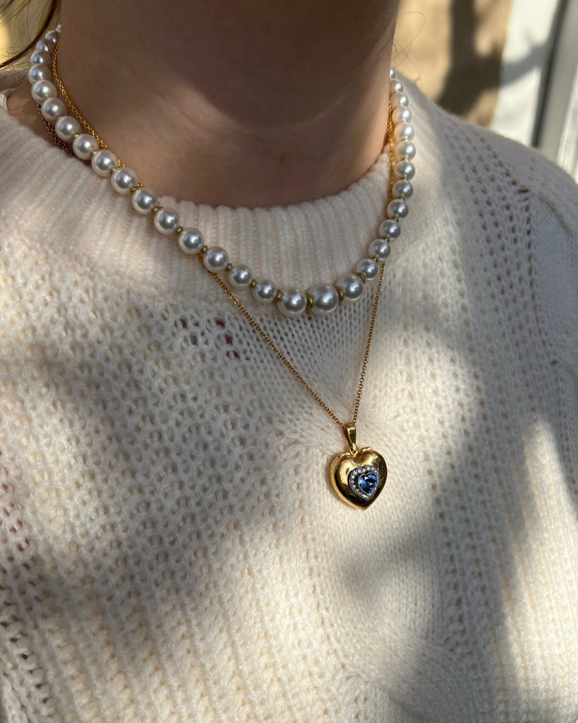 SAPPHIRE HEART LOCKET, 22k yellow gold and oxidized silver 1.30ct heart-shaped sapphire Brilliant cut diamonds 18k yellow gold 18 inch chain Made in Los Angeles, Necklace, Arman Sarkisyan