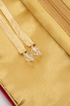 VELVET JEWELRY ROLL - ROSE, Rose colored velvet 
Golden satin linking and tie 
3 pockets; 1 main pocket, 2 zip pockets, and 2 ring holders which unclip, JEWELRY CASES, Jo Edwards London
